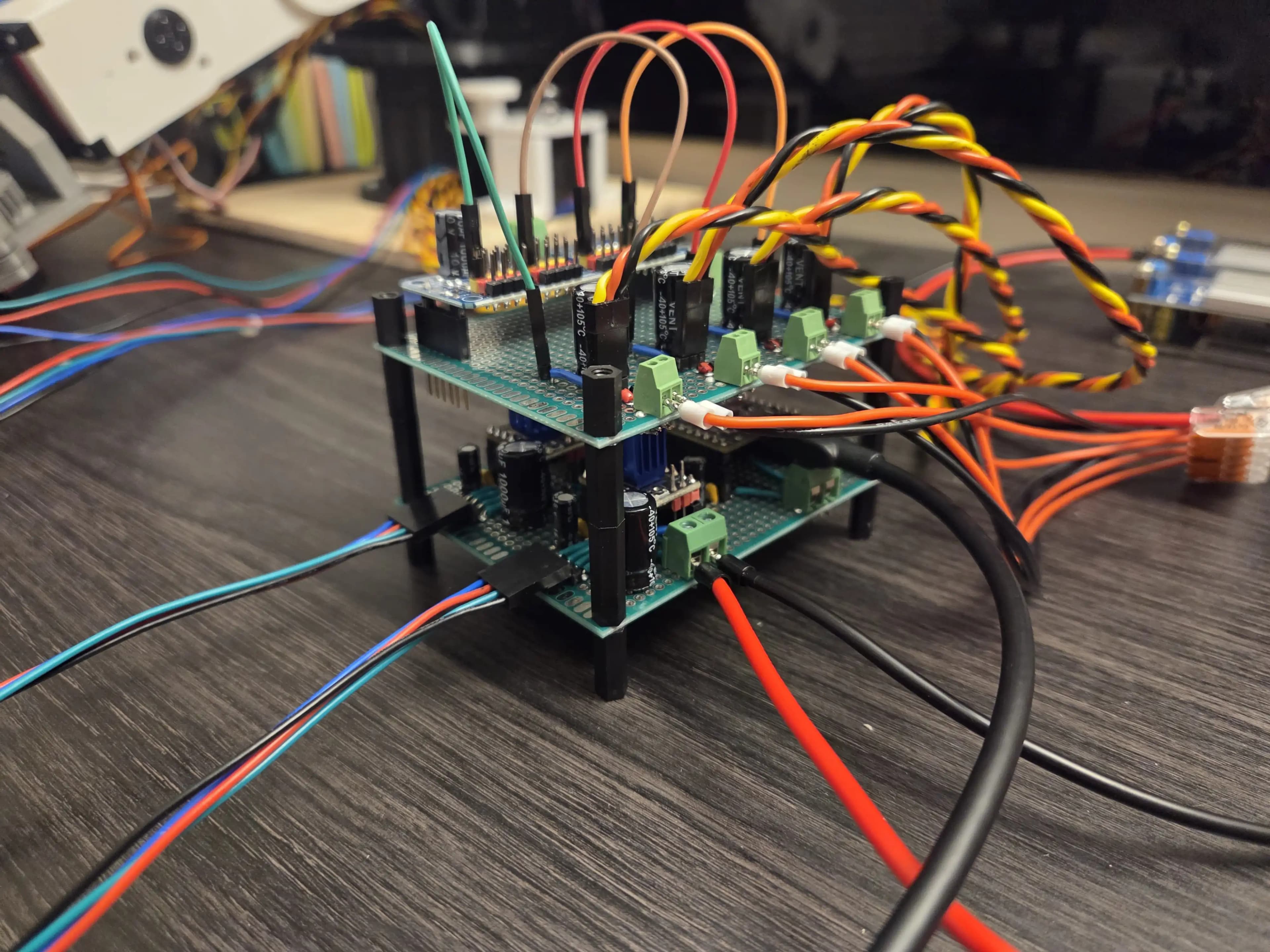 Photo of two perfboards stacked containing the control circuit